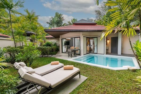 Dubai villa indoor-outdoor living space with private pool and garden